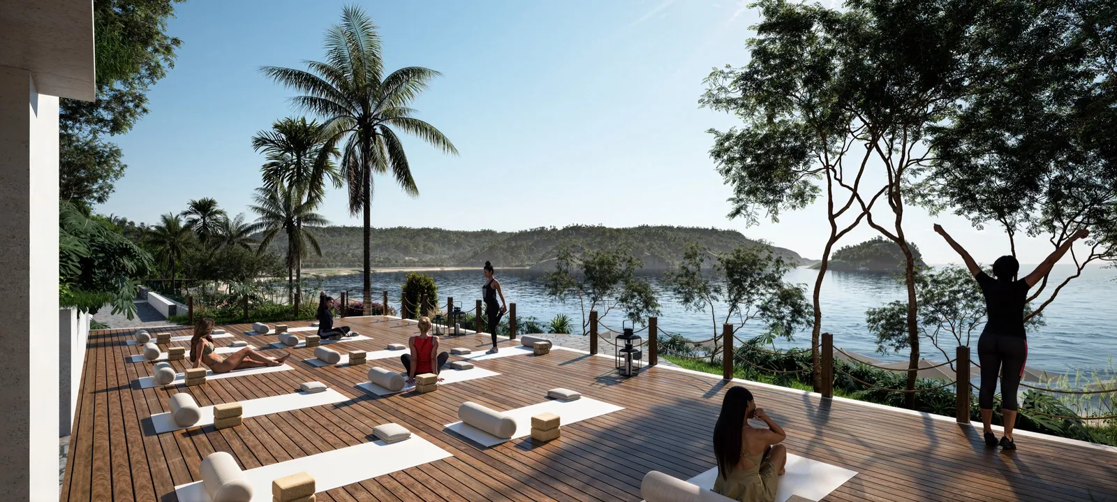A render of the yoga deck: mats and cushions on a timber deck among palms, with people stretching and the bay behind.